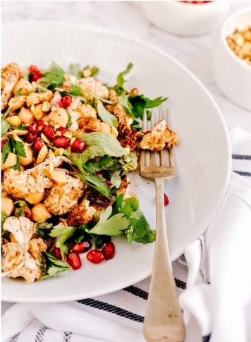 A bowl of roasted cauliflower summer salad.